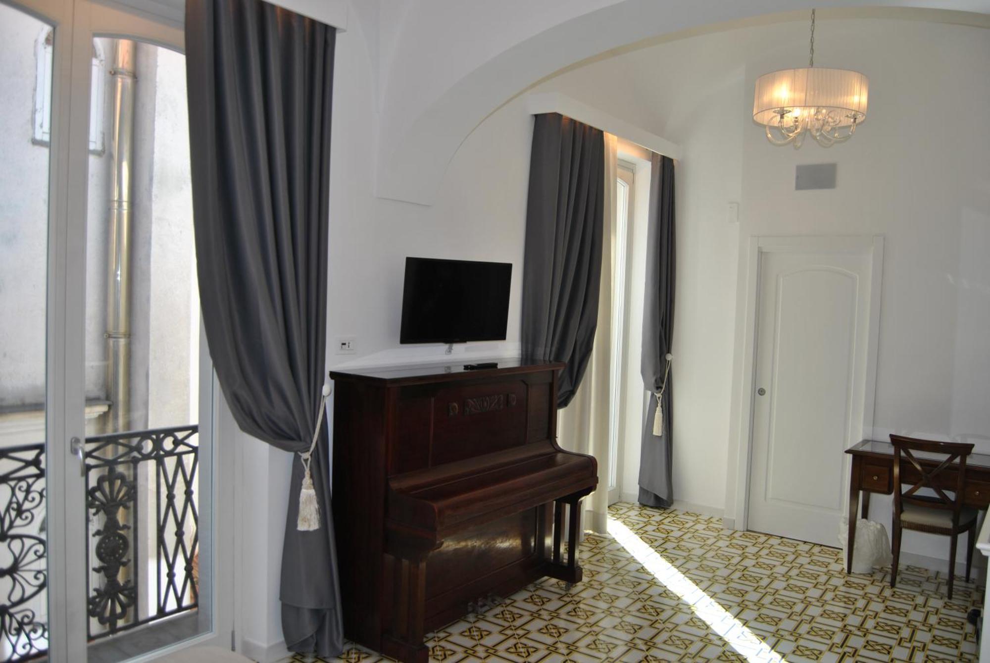 Core Amalfitano City Suites Bagian luar foto