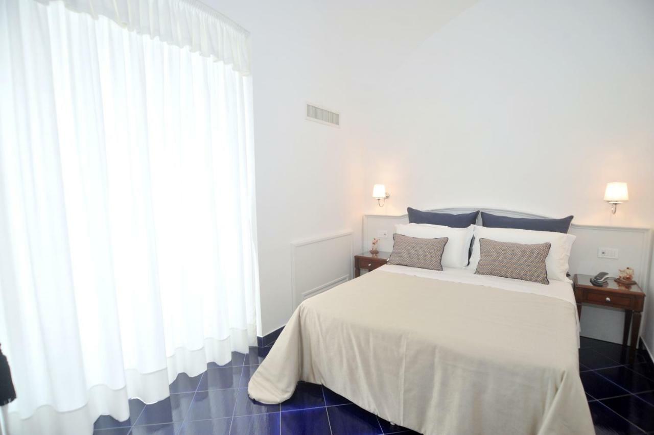 Core Amalfitano City Suites Bagian luar foto